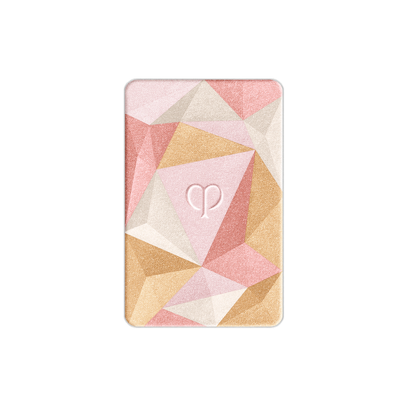 Photo of the 26 AW Holiday Collection limited-edition THE LUMINIZING FACE ENHANCER refill. The geometric multi-colored powder forms a mosaic pattern across the rectangular tray, with the embossed Cl&eacute; de Peau Beaut&eacute; logo centered on a pale pink facet.